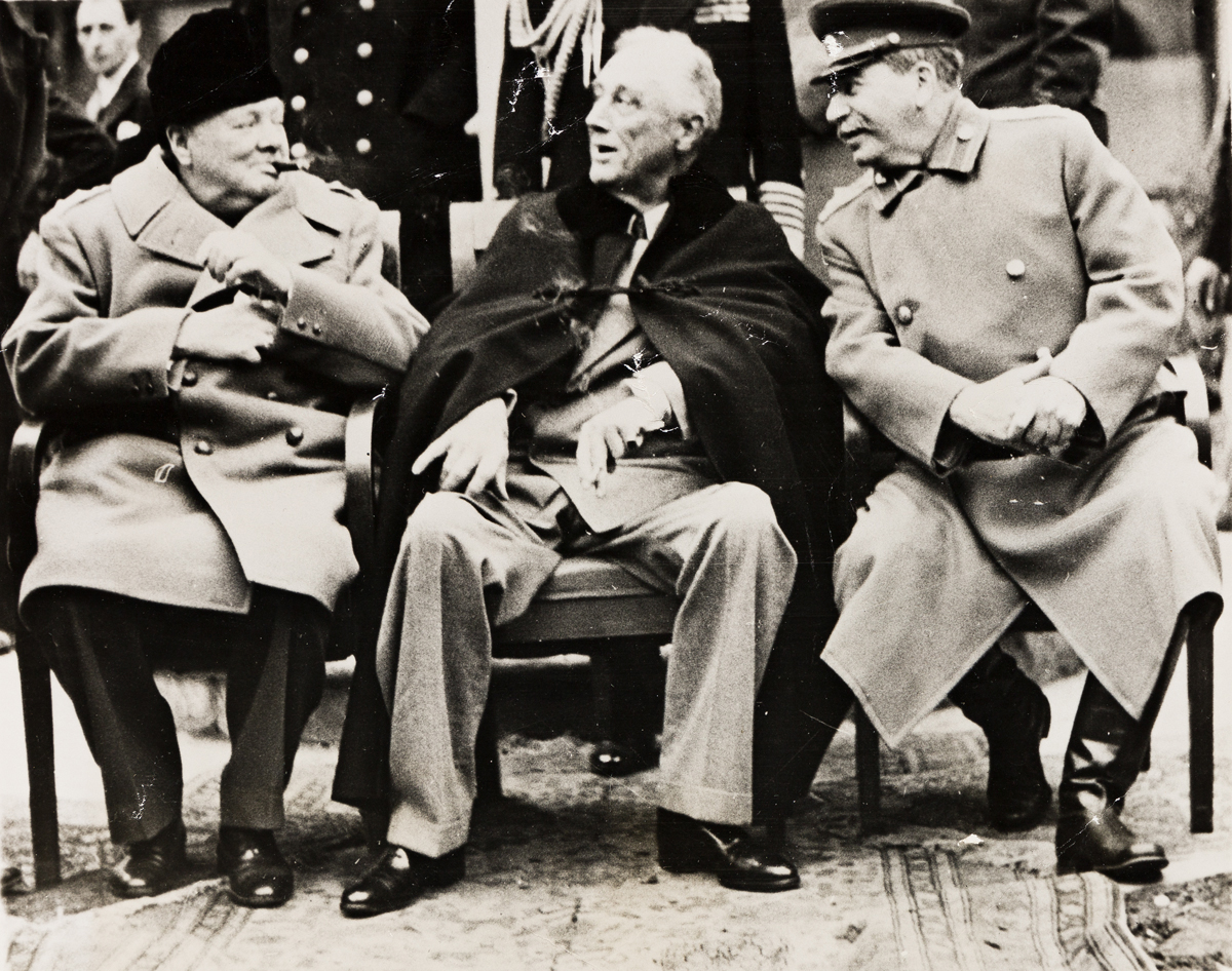 (THE BIG THREE--YALTA) Suite of 3 photographs depicting Winston Churchill, Josef Stalin, and Franklin D. Roosevelt at the transformativ